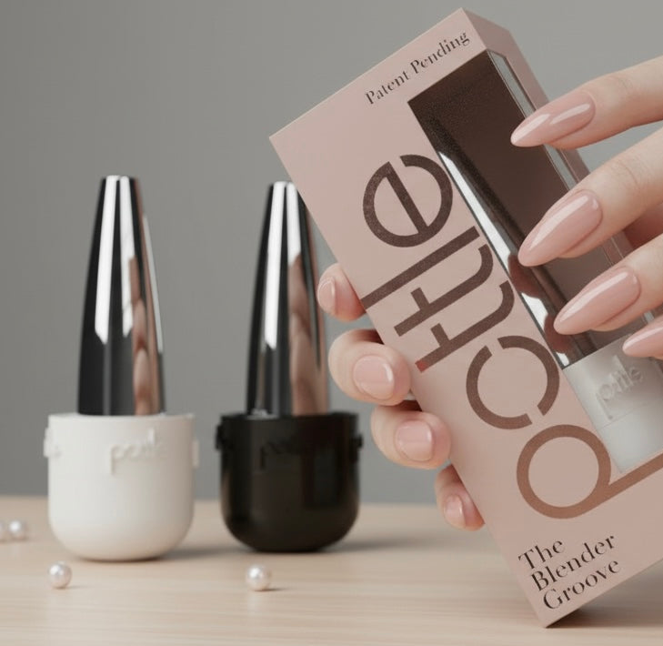 Hand holding a box of 'pottle' with two nail polish containers in the background.